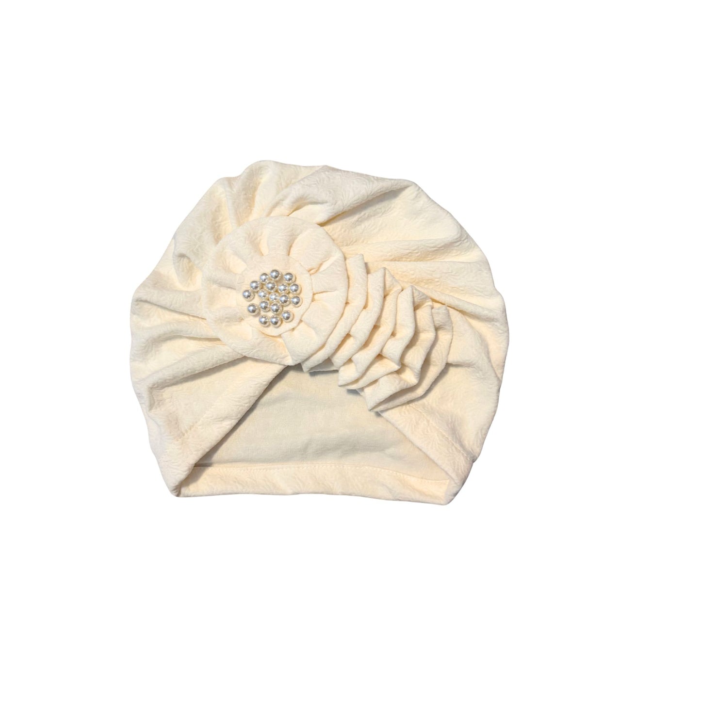Cream-colored headband with a decorative element on a white background