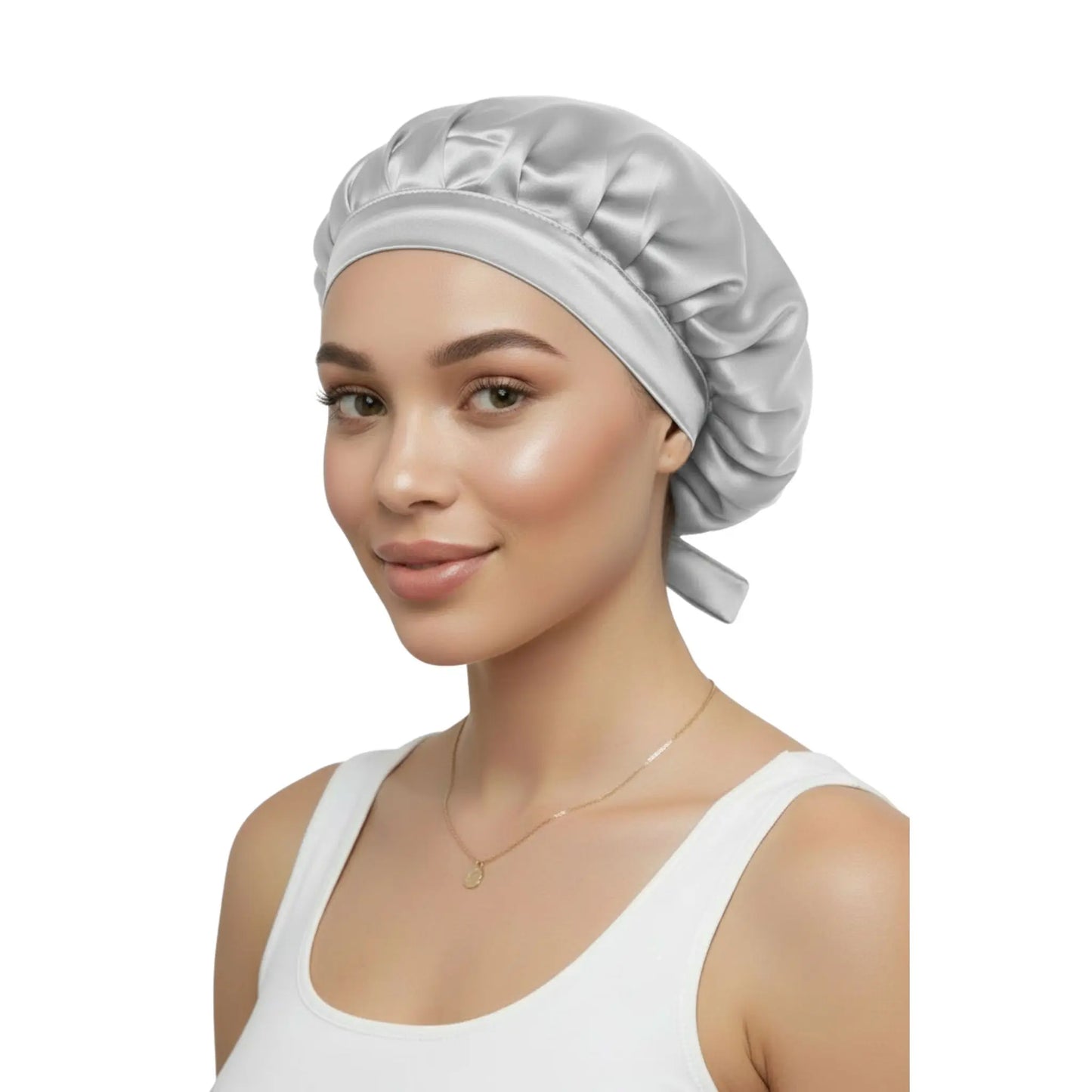 Woman wearing a silver silk bonnet on a white background