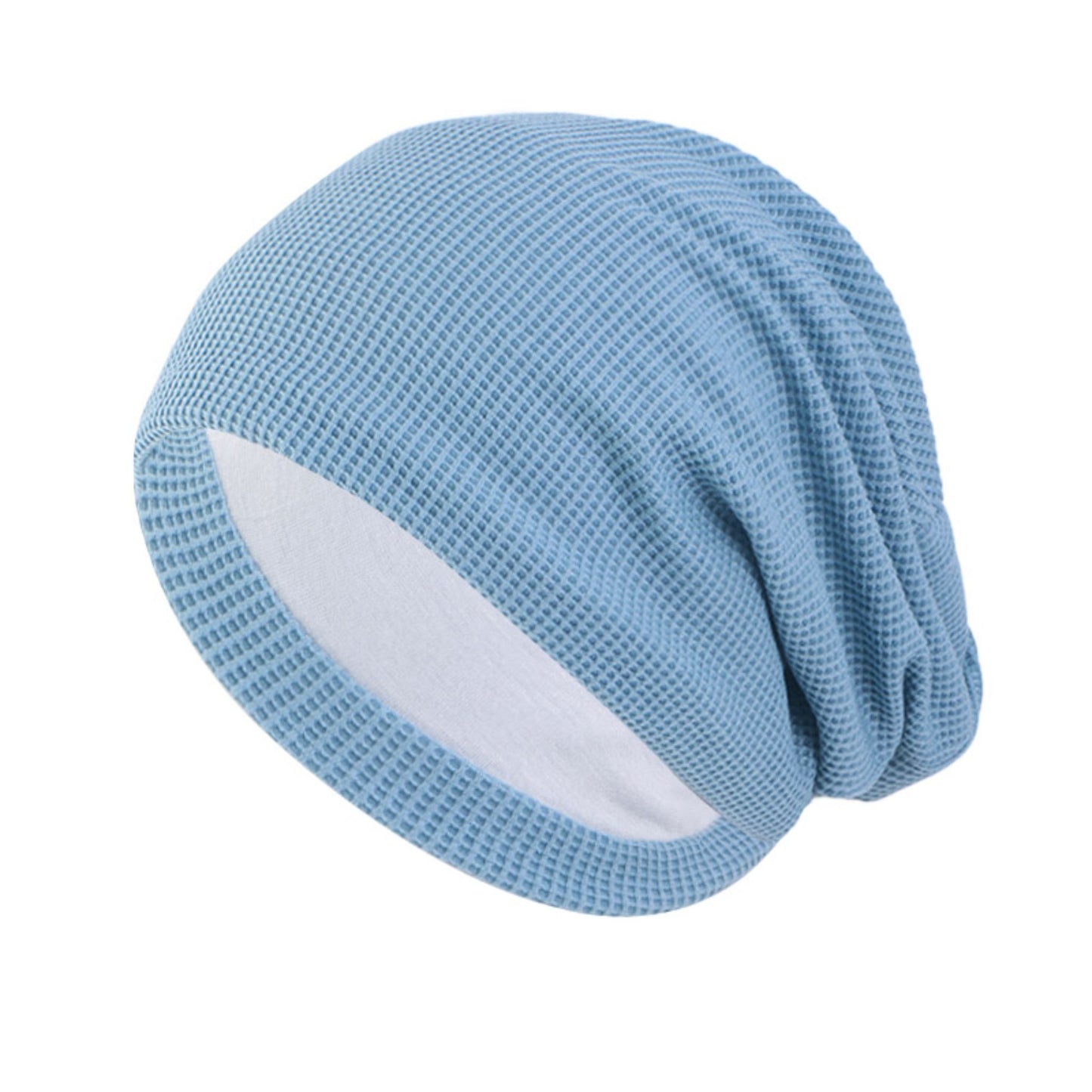 Denim blue chemo beanie hat on a white background