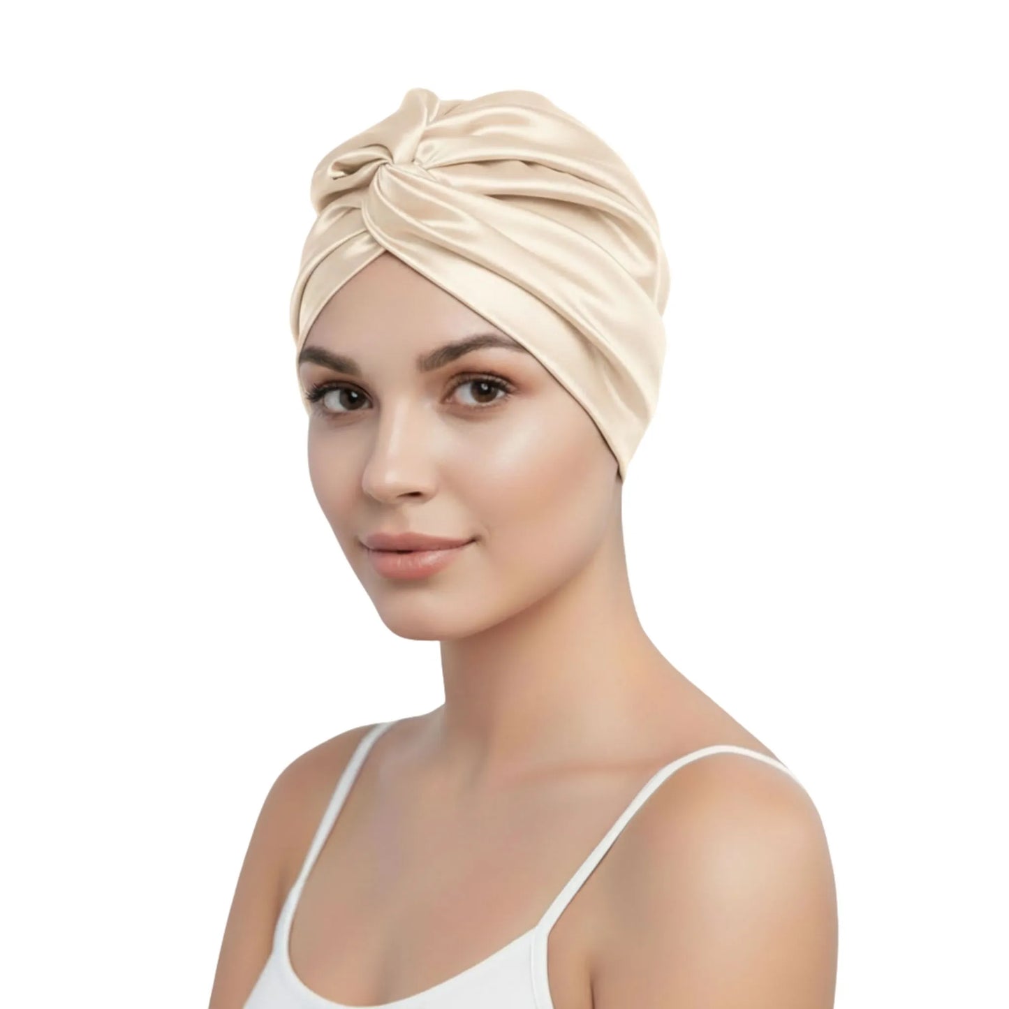 woman wearing a beige silk turban on a white background