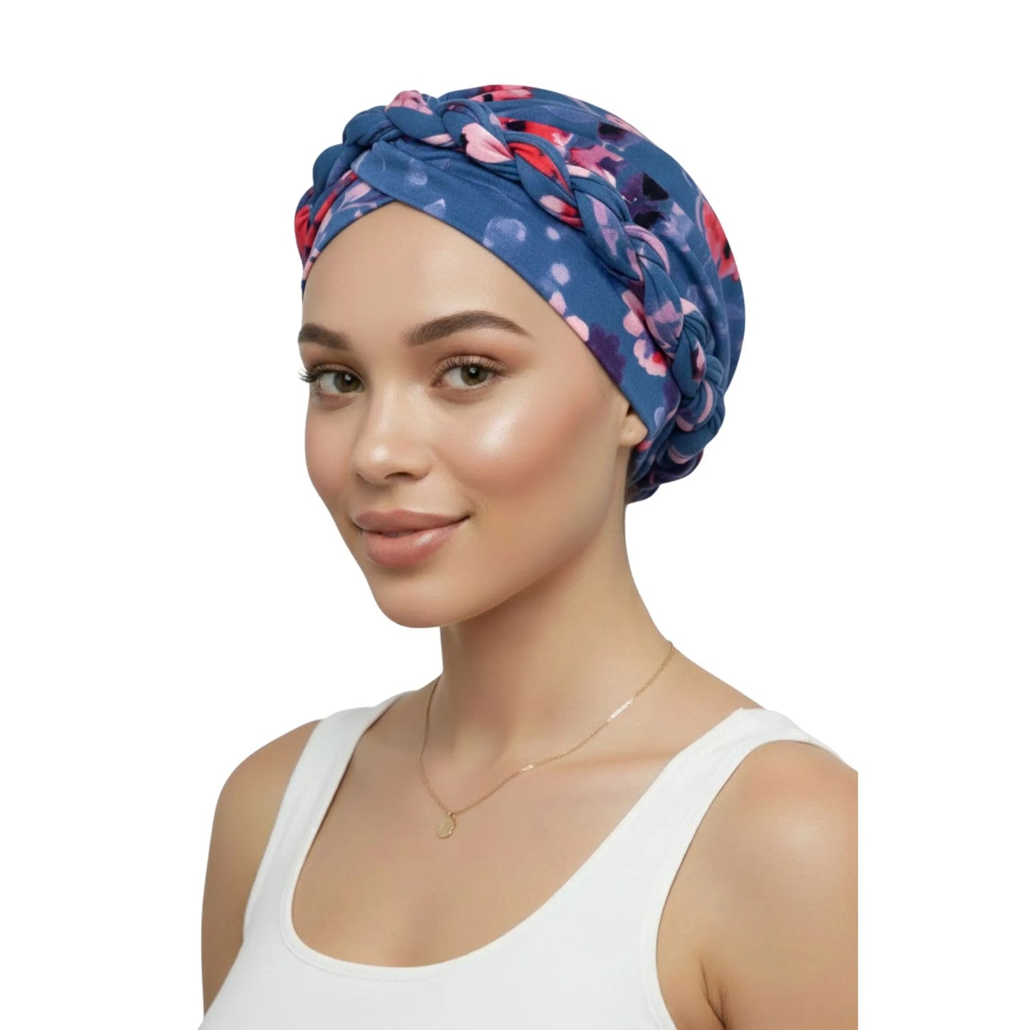 Woman wearing a blue floral headscarf on a white background