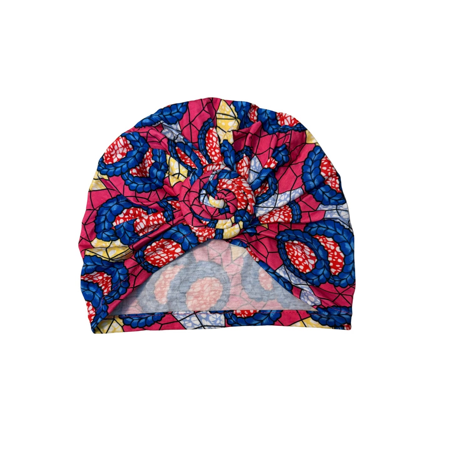 Colorful patterned head wrap on a white background