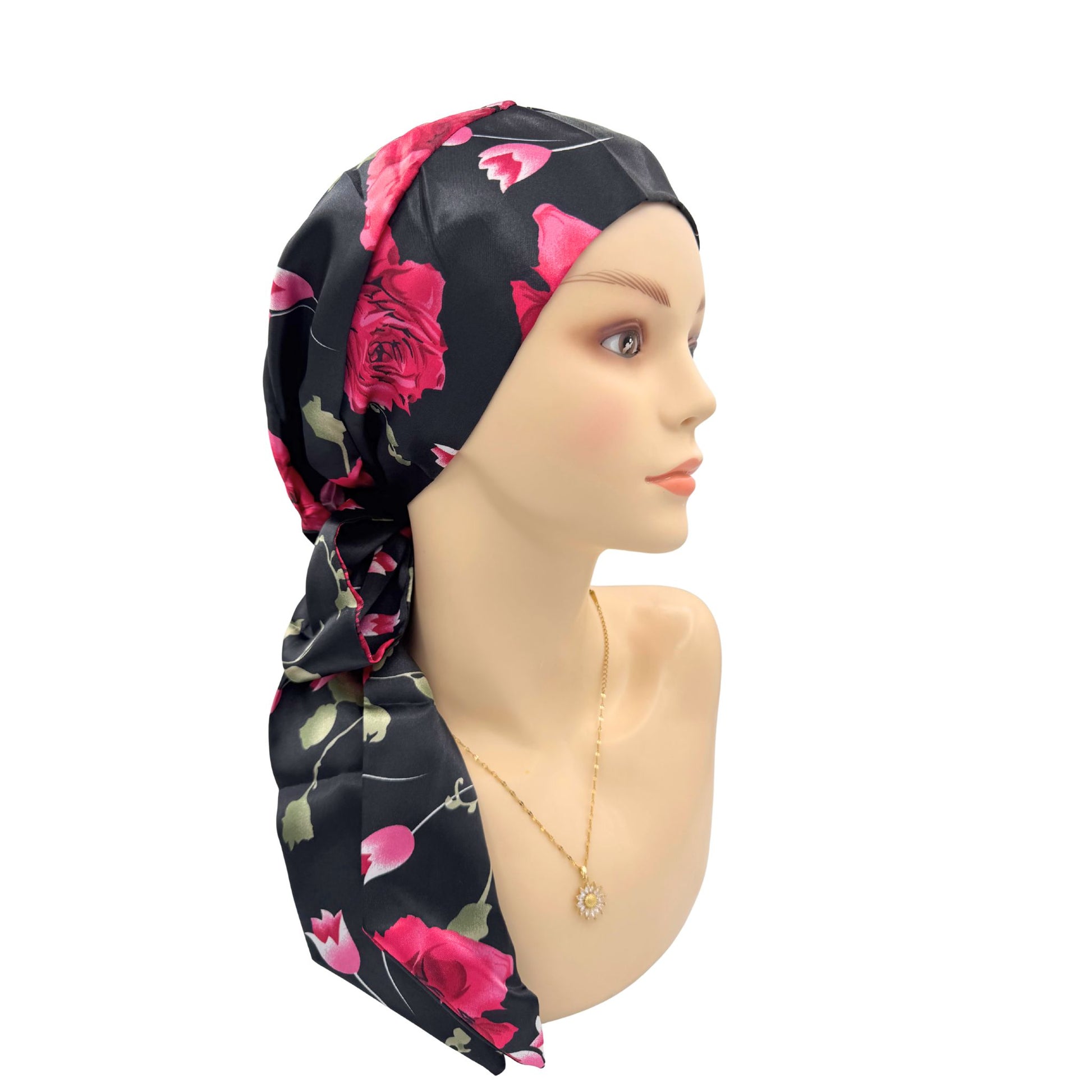Floral headscarf on a mannequin head with a white background