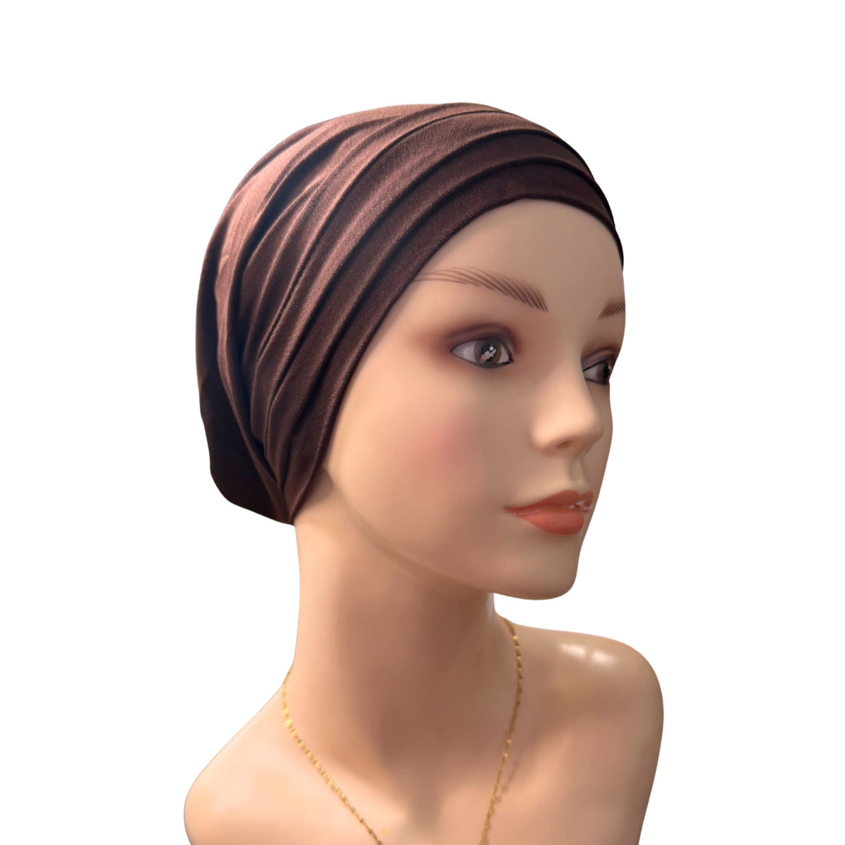 A mannequin wearing a coffee Chemo Head Wrap on a white background
