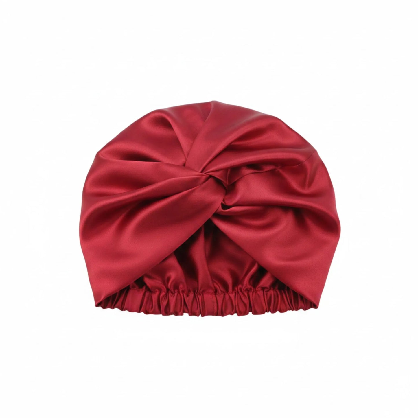 Red silk hat turban on a white background