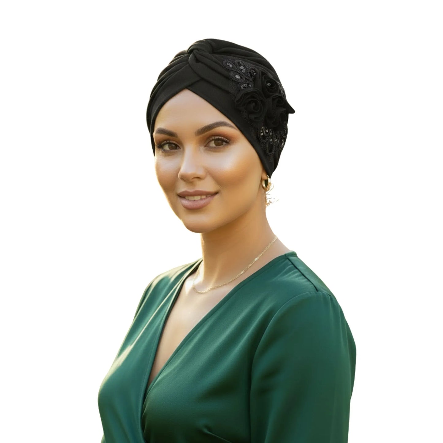 Woman wearing a black floral turban on white background