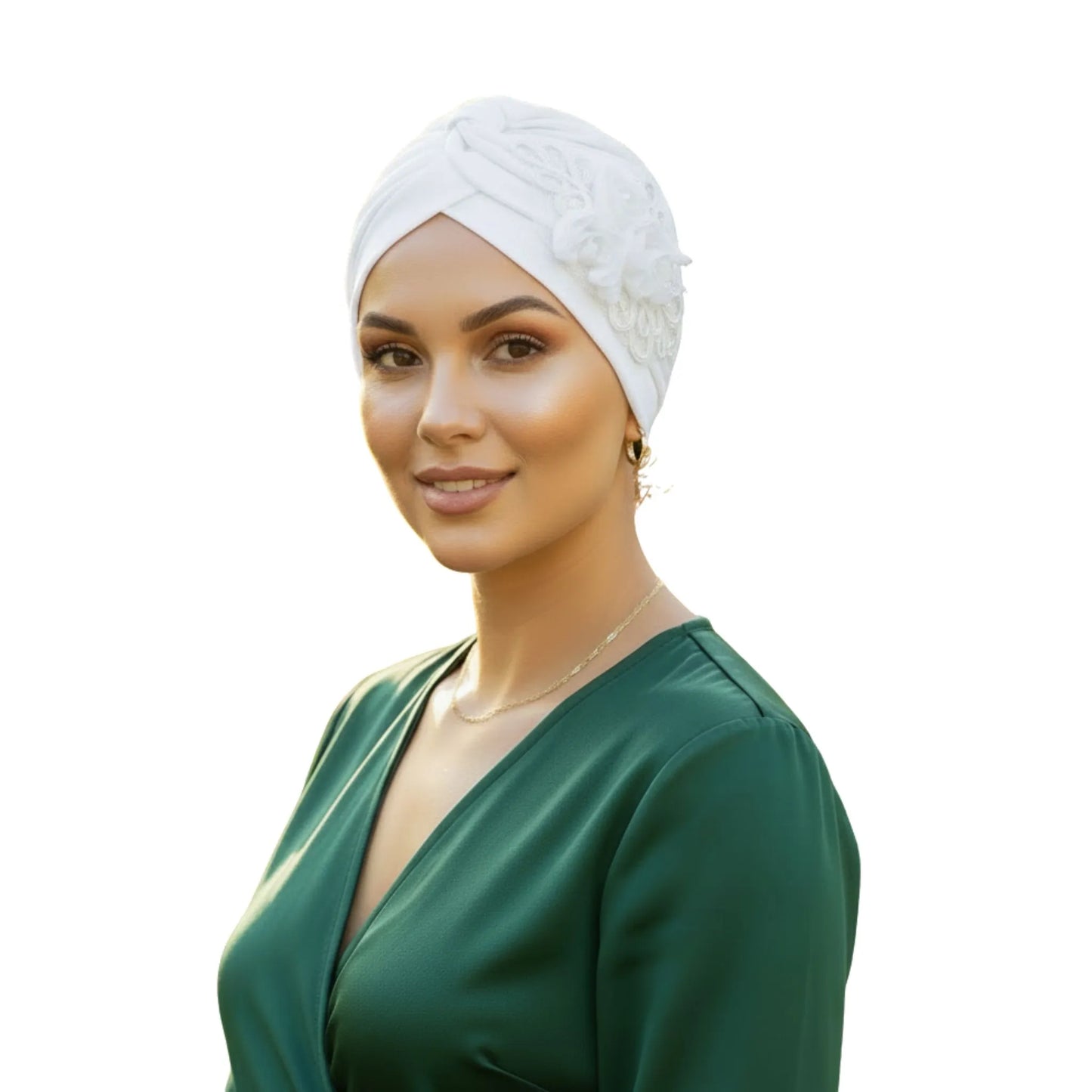 Woman wearing a white floral turban on white background